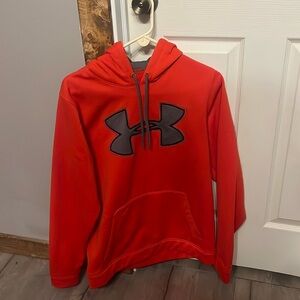 Red/orange under-armour hoodie.